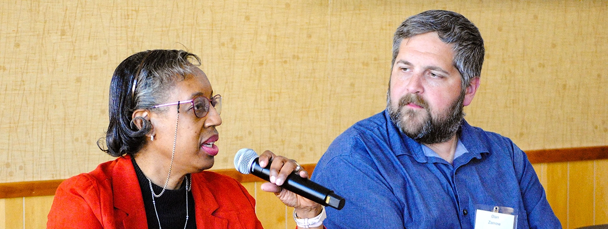 Two panelists from the Robinson Symposium